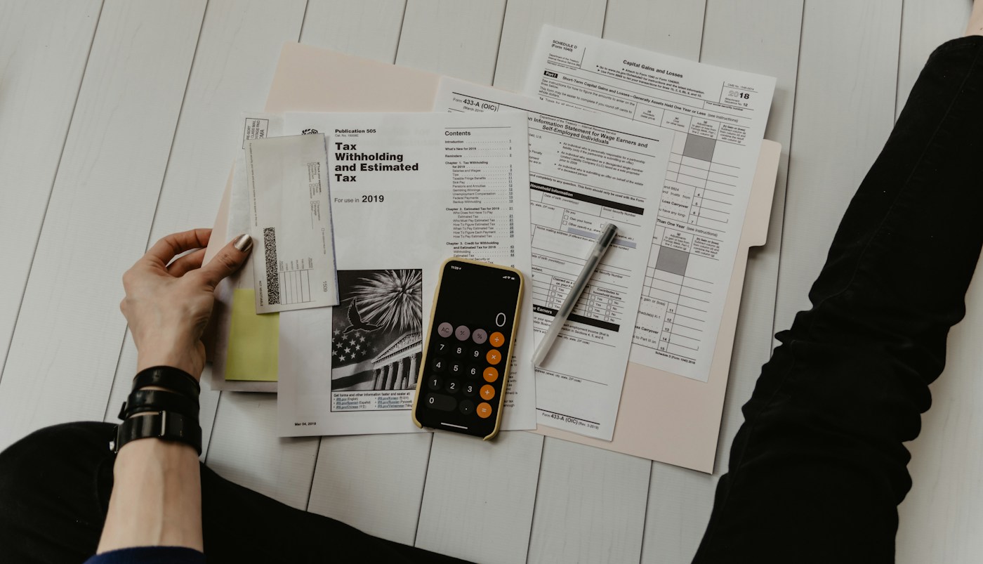 Financial planning materials, calculator, and accounting documents